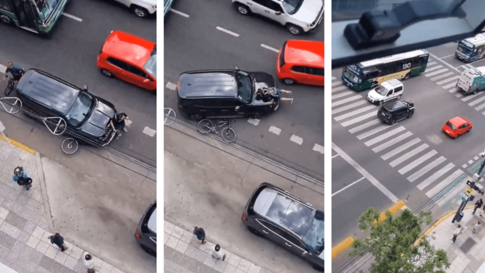 ¡VIDEO! Colombiana de 22 años chocó a ciclista ruso intentando estacionar, quisó fugarse y lo hizo con este colgado del capot