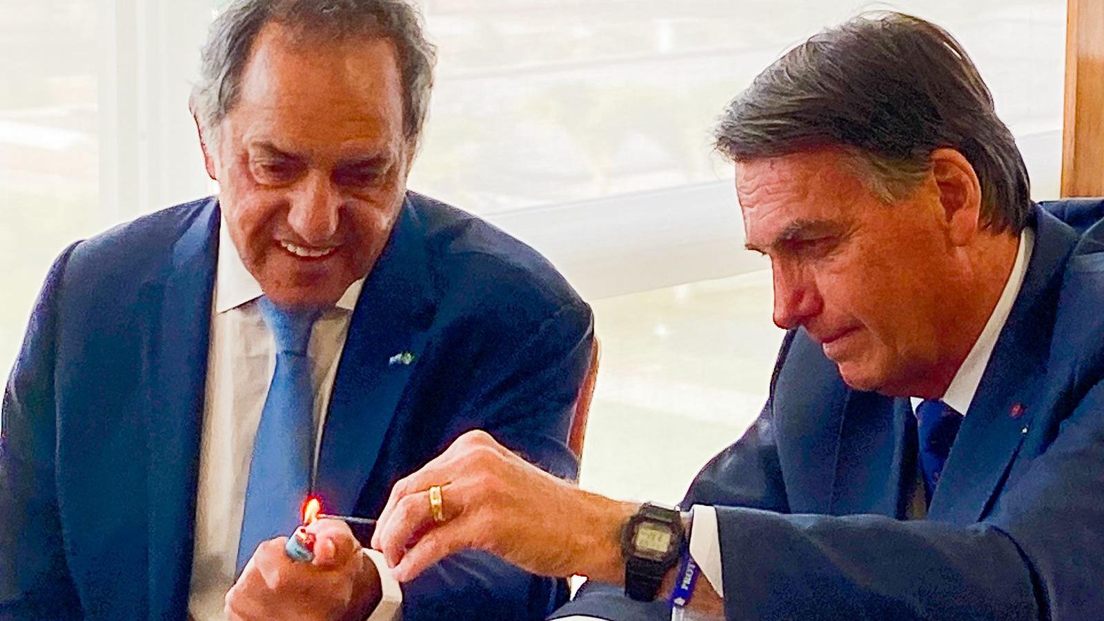 Scioli, Bolsonaro y una reunión con sonrisas de ambos lados.