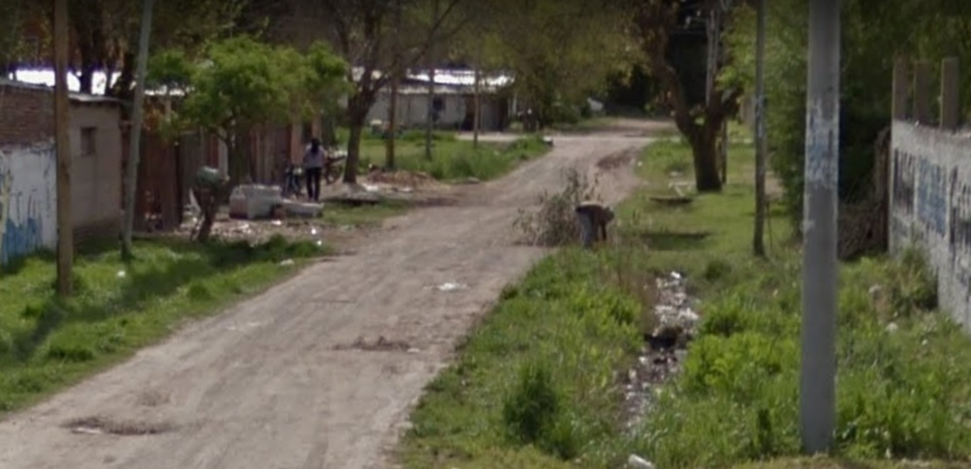 Acá, en este vecindario, fue encontrado el cadáver degollado de la muchacha.