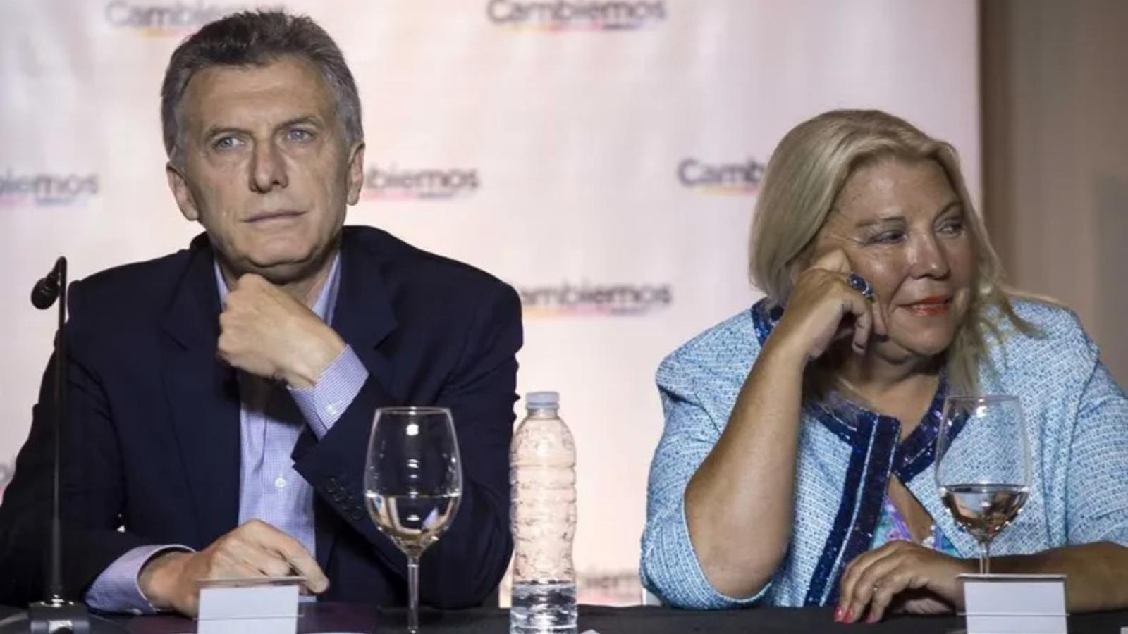 Mauricio Macri y Elisa Carrió, con sus miradas en distintos puntos (Archivo).